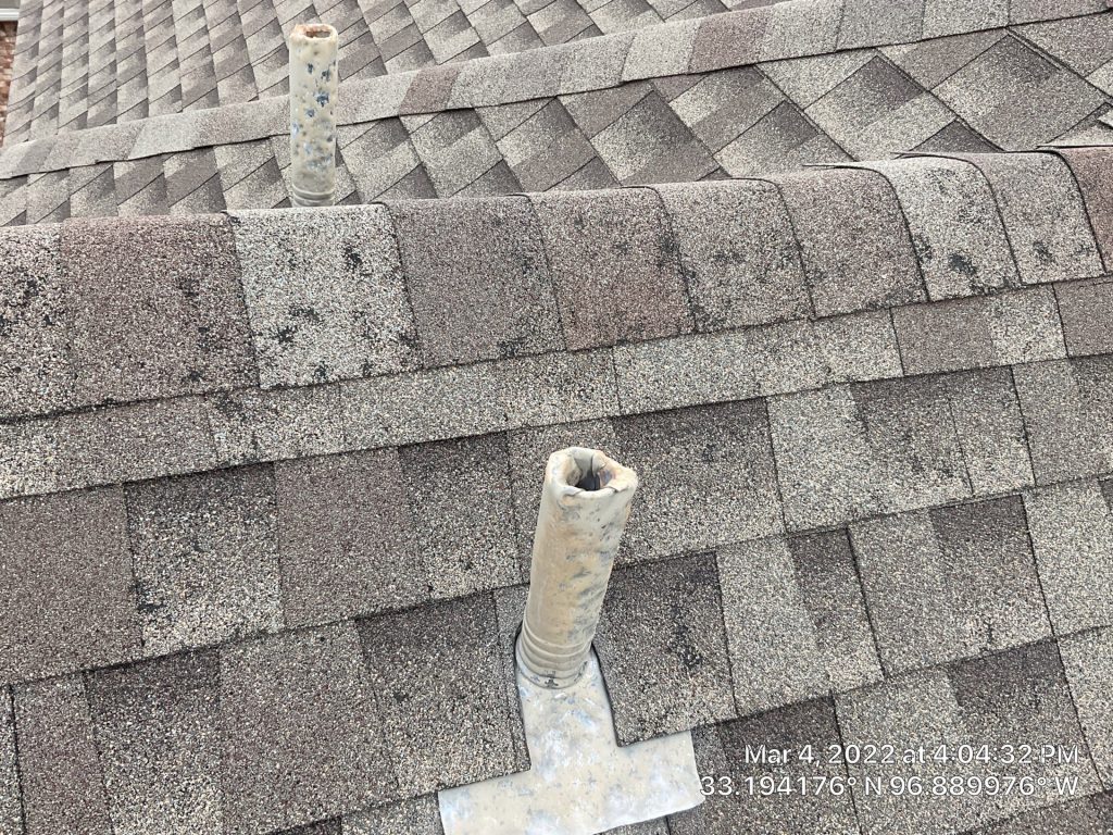 Hail and storm damage on a roof in Grand Prairie TX