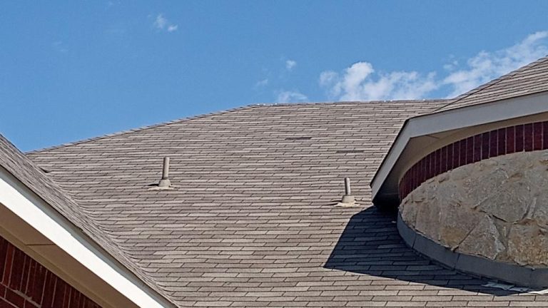 Wind-damaged shingle roof documented for storm restoration planning