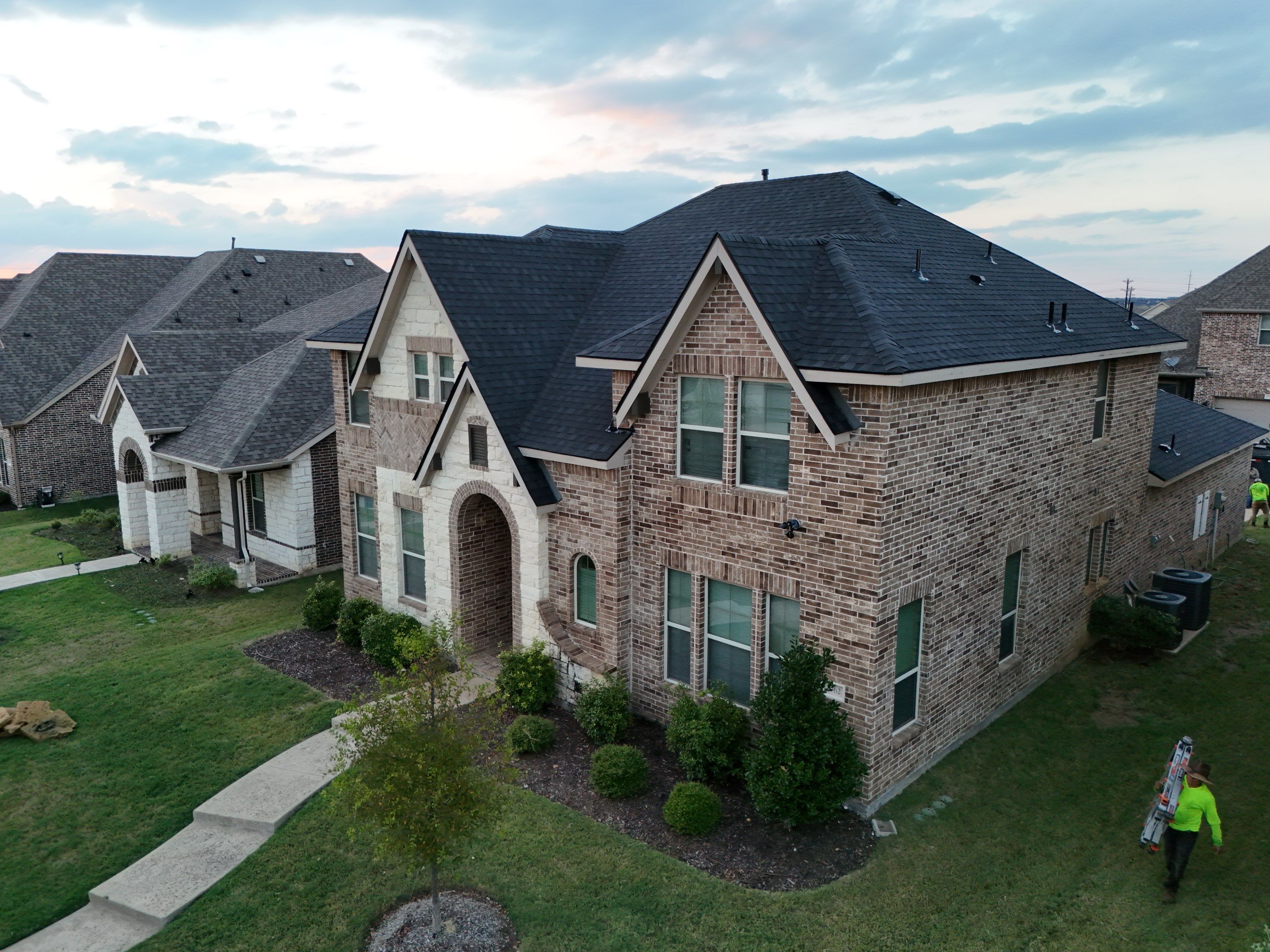 Roof repair project completed by New Life Restoration & Construction in Frisco, TX